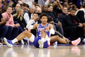 Matisse Thybulle sitting on the court