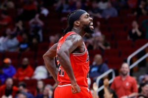 Patrick Beverley #21 of the Chicago Bulls reacts to hitting a three point basket against the Houston Rockets during the second half at Toyota Center on March 11, 2023 in Houston, Texas.