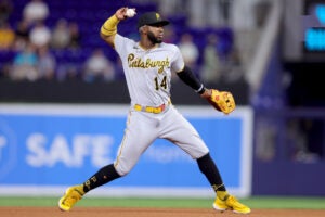 MIAMI, FLORIDA - JUNE 23: Rodolfo Castro #14 of the Pittsburgh Pirates throws to first base for an out against the Miami Marlins during the seventh inning at loanDepot park on June 23, 2023 in Miami, Florida.