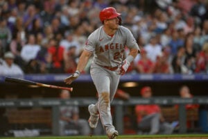 DENVER, CO - JUNE 24: Mike Trout #27 of the Los Angeles Angels watches the flight of a third inning solo homerun in a game against the Colorado Rockies at Coors Field on June 24, 2023 in Denver, Colorado. Phillies