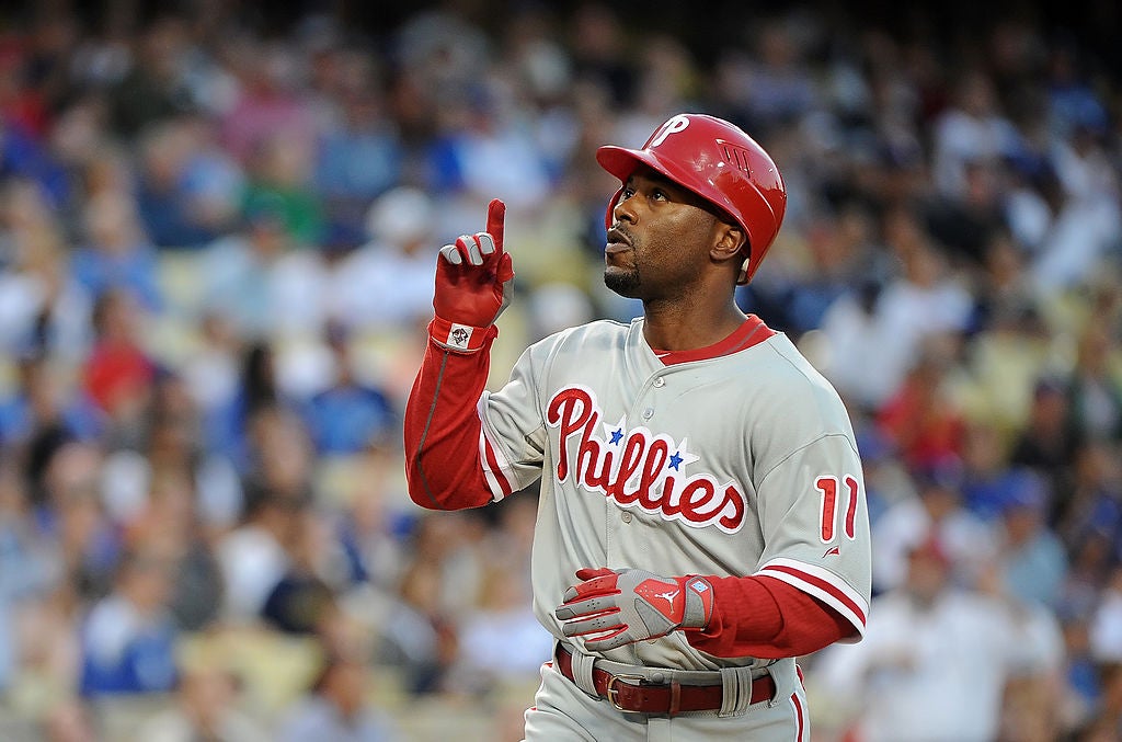 Jimmy Rollins #11 of the Philadelphia Phillies celebrates after hitting a homerun in the third inning against the Los Angeles Dodgers at Dodger Stadium on July 16, 2012 in Los Angeles, California. Philadelphia athletes