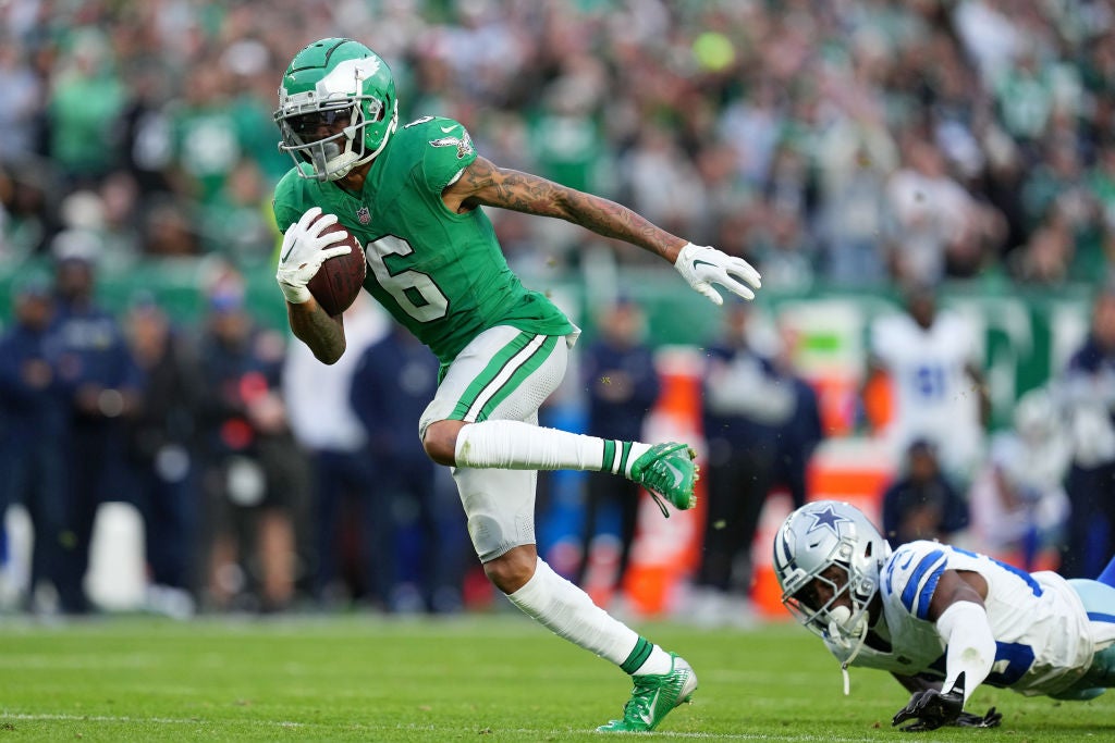 PHILADELPHIA, PENNSYLVANIA - DECEMBER 29: DeVonta Smith #6 of the Philadelphia Eagles carries the ball against the Dallas Cowboys during the fourth quarter at Lincoln Financial Field on December 29, 2024 in Philadelphia, Pennsylvania.