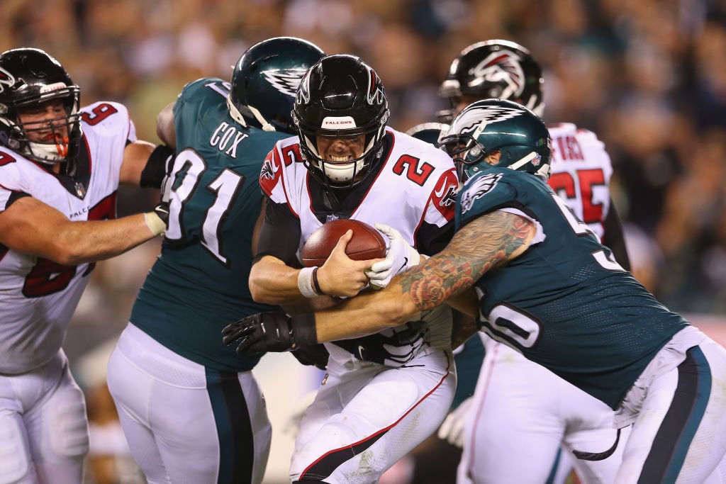 PHILADELPHIA, PA - SEPTEMBER 06:  Matt Ryan #2 of the Atlanta Falcons is sacked by Chris Long #56 of the Philadelphia Eagles during the fourth quarter at Lincoln Financial Field on September 6, 2018 in Philadelphia, Pennsylvania. 