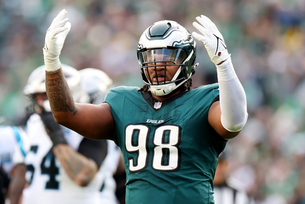 PHILADELPHIA, PENNSYLVANIA - DECEMBER 08: Jalen Carter #98 of the Philadelphia Eagles celebrates during a game against the Carolina Panthers at Lincoln Financial Field on December 08, 2024 in Philadelphia, Pennsylvania.