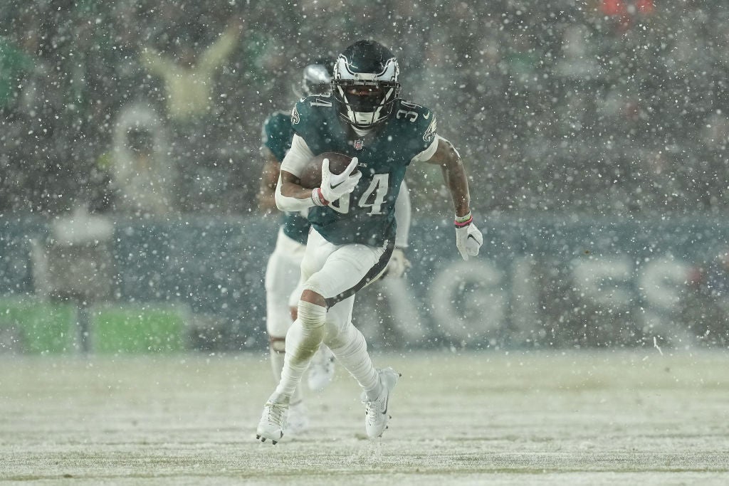 PHILADELPHIA, PENNSYLVANIA - JANUARY 19: Isaiah Rodgers #34 of the Philadelphia Eagles runs with the ball after recovering a fumble by Kyren Williams #23 of the Los Angeles Rams (not pictured) during the fourth quarter in the NFC Divisional Playoff at Lincoln Financial Field on January 19, 2025 in Philadelphia, Pennsylvania.