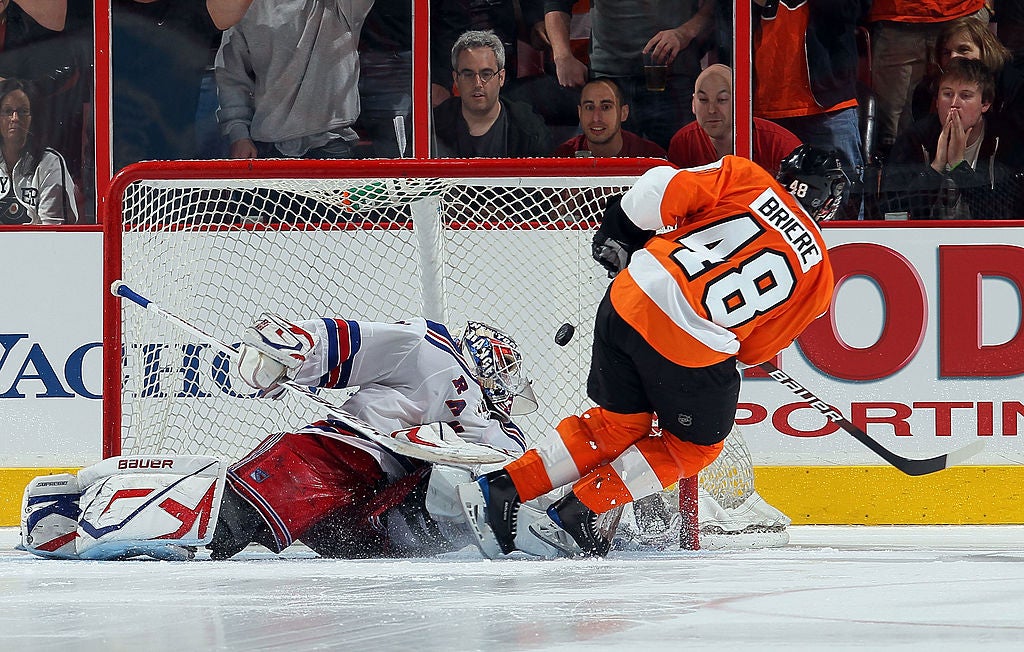 Daniel Briere #48 of the Philadelphia Flyers scores a shootout goal past Henrik Lundqvist #30 of the New York Rangers on April 11, 2010 at Wachovia Center in Philadelphia, Pennsylvania. The Flyers defeated the Rangers 2-1 after a shootout. The victory clinched a playoff berth for Philadelphia.