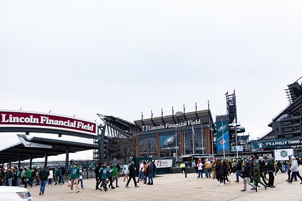 People tailgate at Lincoln Financial Field. Transportation for Eagles vs Commanders.