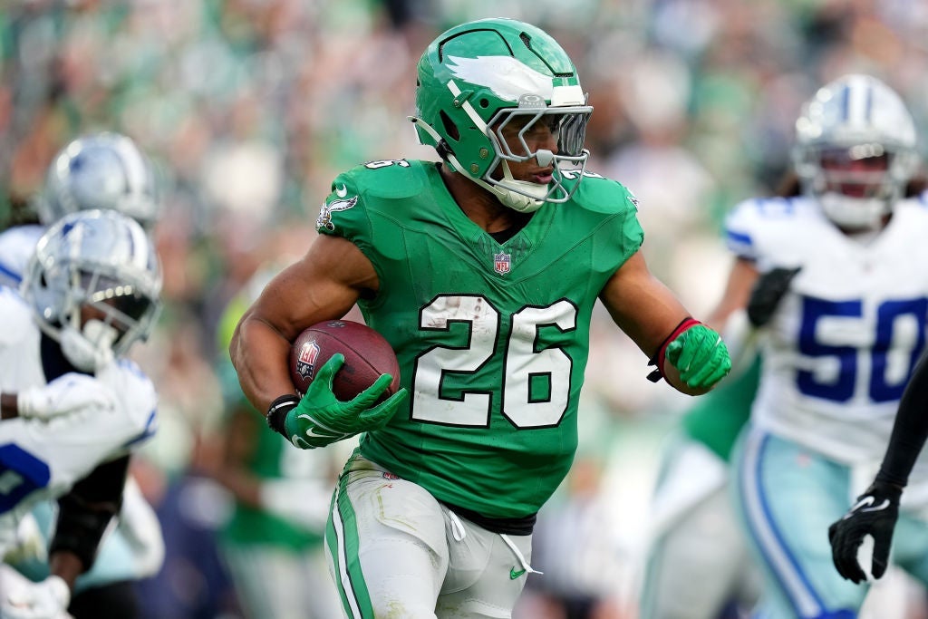 PHILADELPHIA, PENNSYLVANIA - DECEMBER 29: Saquon Barkley #26 of the Philadelphia Eagles runs the ball against the Dallas Cowboys during the third quarter at Lincoln Financial Field on December 29, 2024 in Philadelphia, Pennsylvania.