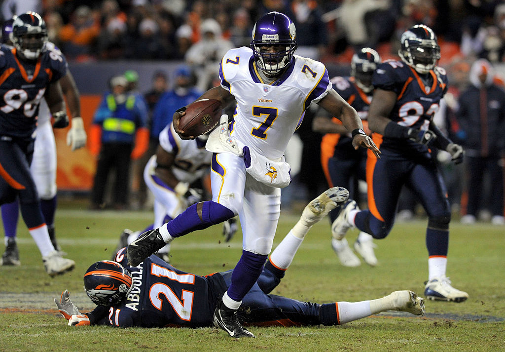 DENVER - DECEMBER 30:  Quarterback Tarvaris Jackson #7 of the Minnesota Vikings breaks loose for a long run in the fourth quarter of the football game against the Denver Broncos at Invesco Field at Mile High December 30, 2007 in Denver, Colorado. 