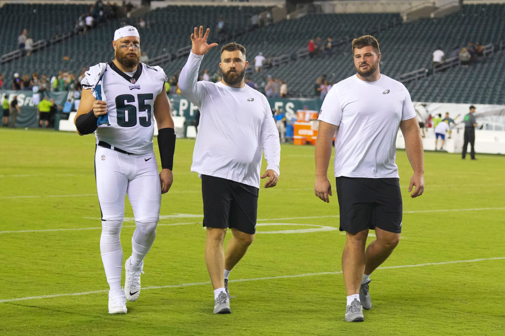 PHILADELPHIA, PA - AUGUST 12: Lane Johnson #65, Jason Kelce #62, and Landon Dickerson #69 of the Philadelphia Eagles walk off the field after the preseason game against the New York Jets at Lincoln Financial Field on August 12, 2022 in Philadelphia, Pennsylvania. The Jets defeated the Eagles 24-21. (