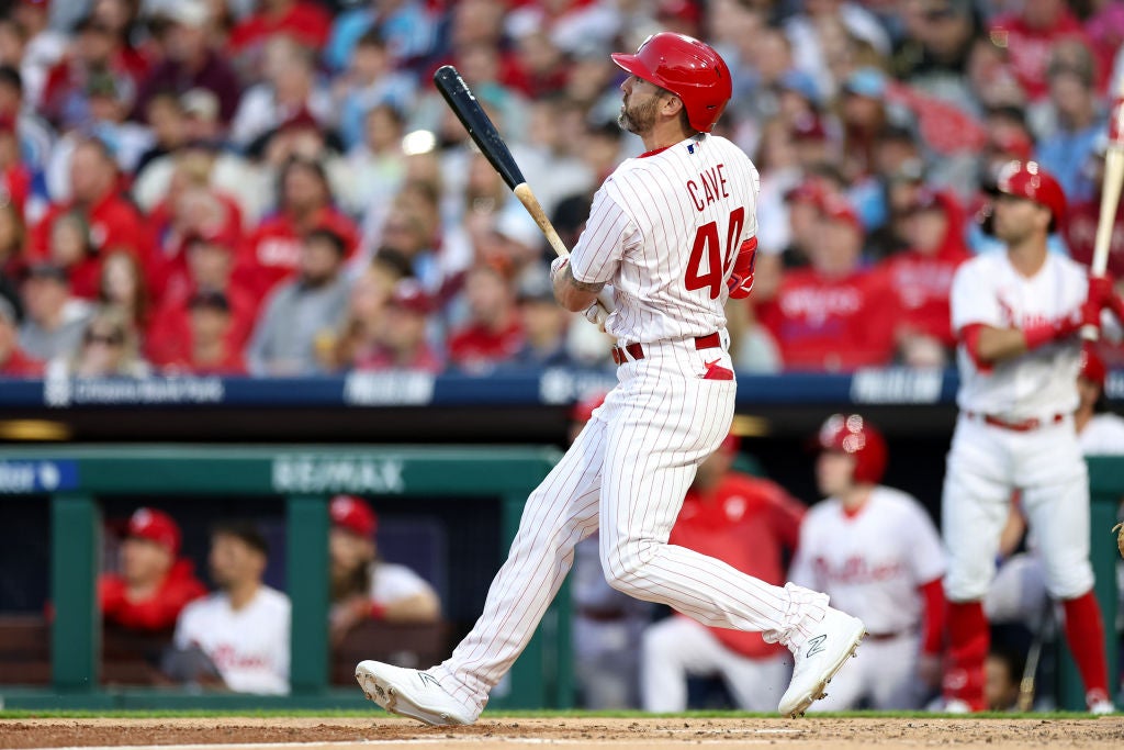 PHILADELPHIA, PENNSYLVANIA - APRIL 10: Jake Cave #44 of the Philadelphia Phillies hits a solo home run during the third inning against the Miami Marlins at Citizens Bank Park on April 10, 2023 in Philadelphia, Pennsylvania.