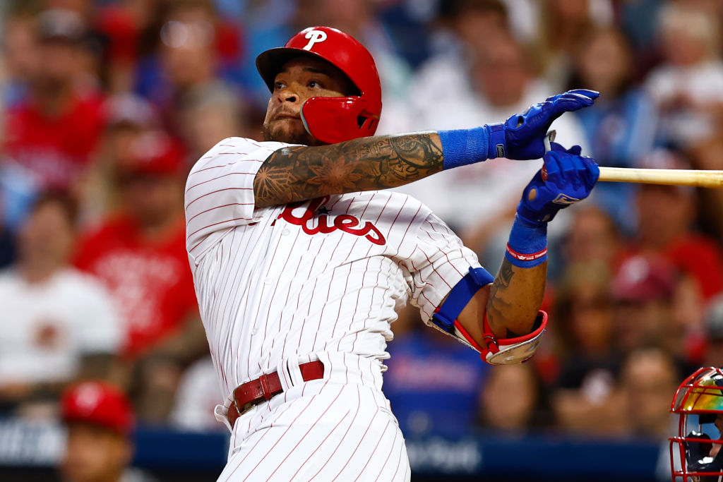 PHILADELPHIA, PENNSYLVANIA - SEPTEMBER 11: Edmundo Sosa #33 of the Philadelphia Phillies hits a two-run double against the Atlanta Braves during the first inning of game two of a double header at Citizens Bank Park on September 11, 2023 in Philadelphia, Pennsylvania.