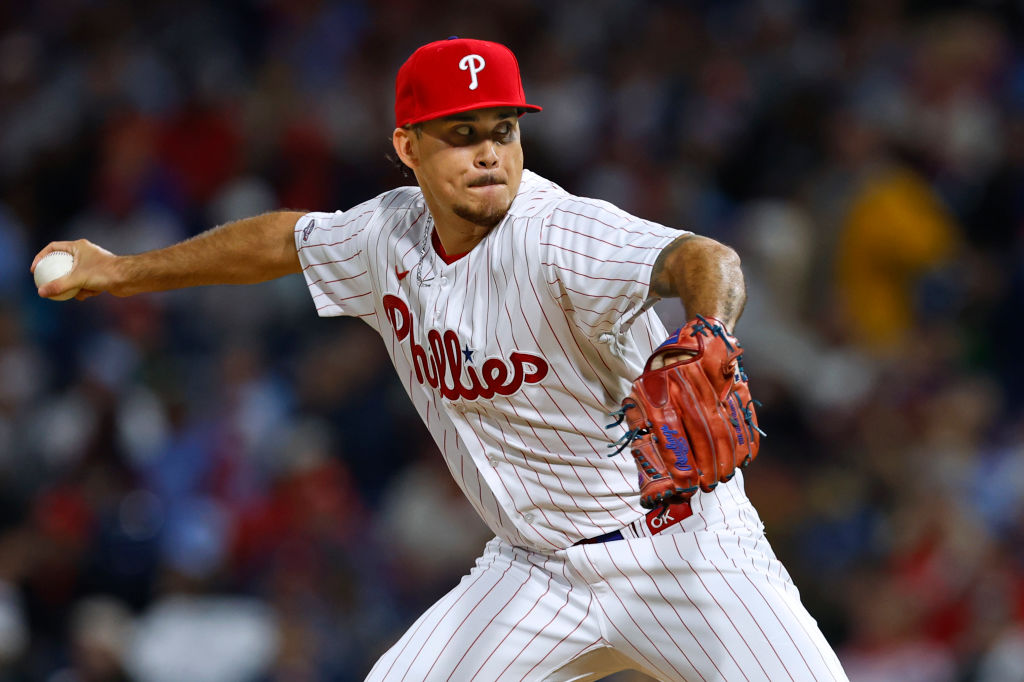 PHILADELPHIA, PENNSYLVANIA - SEPTEMBER 24: Orion Kerkering #50 of the Philadelphia Phillies pitches enroute to a scoreless eighth inning of his major league debut against the New York Mets at Citizens Bank Park on September 24, 2023 in Philadelphia, Pennsylvania. The Phillies won 5-2. 