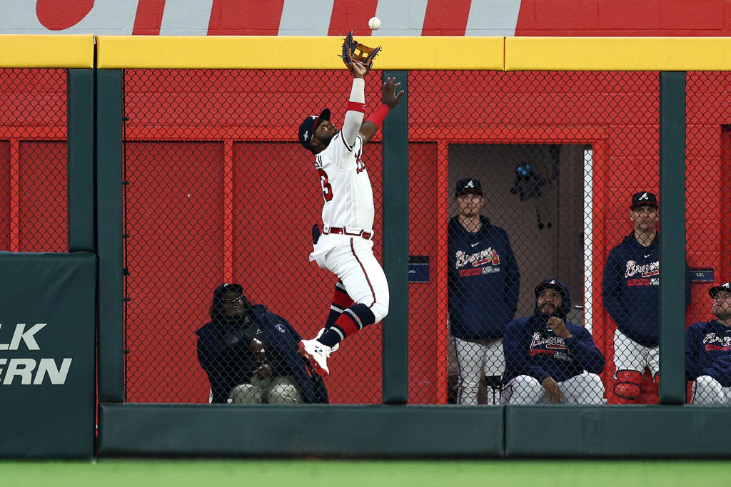 ATLANTA, GEORGIA - OCTOBER 09: Michael Harris II #23 of the Atlanta Braves makes a catch at the wall in the ninth inning against the Philadelphia Phillies during Game Two of the Division Series at Truist Park on October 09, 2023 in Atlanta, Georgia. 
