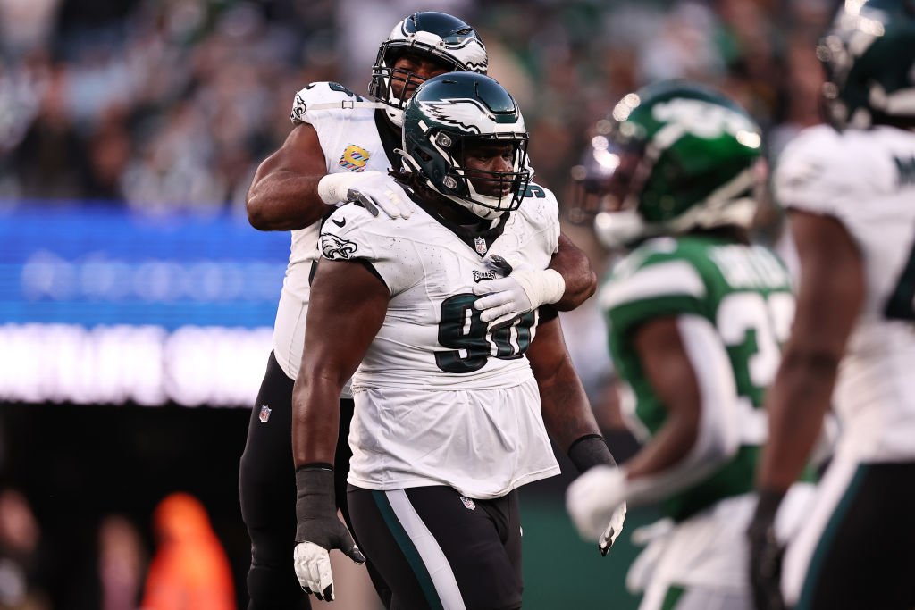 EAST RUTHERFORD, NEW JERSEY - OCTOBER 15: Jordan Davis #90 and Brandon Graham #55 of the Philadelphia Eagles celebrate after a sack during the second quarter in the game against the New York Jets at MetLife Stadium on October 15, 2023 in East Rutherford, New Jersey.