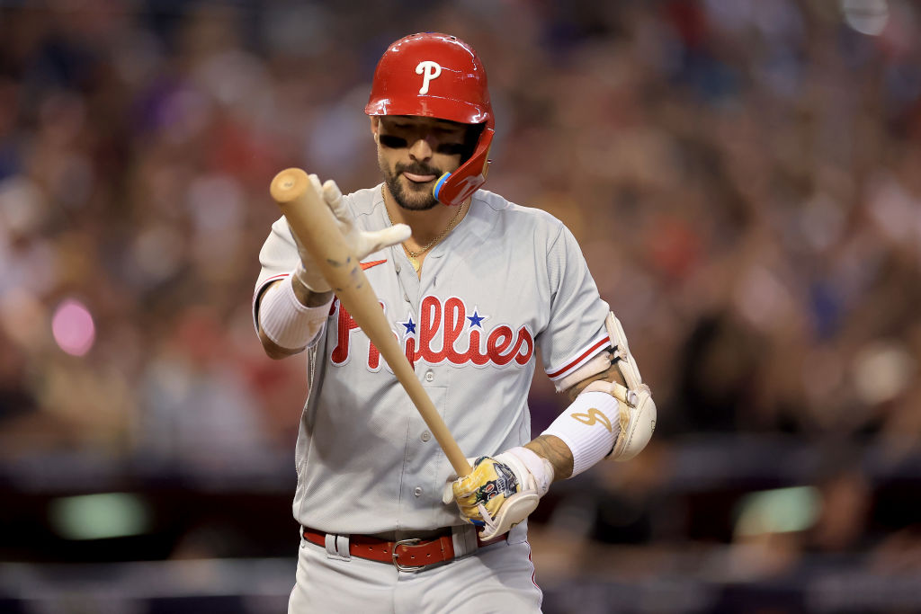 PHOENIX, ARIZONA - OCTOBER 20: Nick Castellanos #8 of the Philadelphia Phillies reacts after striking out against the Arizona Diamondbacks in the third inning during Game Four of the National League Championship Series at Chase Field on October 20, 2023 in Phoenix, Arizona. 