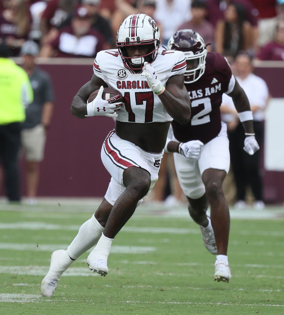 COLLEGE STATION, TEXAS - OCTOBER 28: Xavier Legette #17 of the South Carolina Gamecocks runs with the ball after a catch as Demani Richardson #26 of the Texas A&M Aggies is unable to make the tackle during the second half at Kyle Field on October 28, 2023 in College Station, Texas.