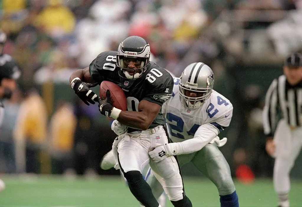 26 Oct 1997:  Defensive back Omar Stoutmire of the Dallas Cowboys (right) attempts to tackle wide receiver Irving Fryar of the Philadelphia Eagles during a game at Veterans Stadium in Philadelphia, Pennsylvania.  The Eagles won the game, 13-12. 
