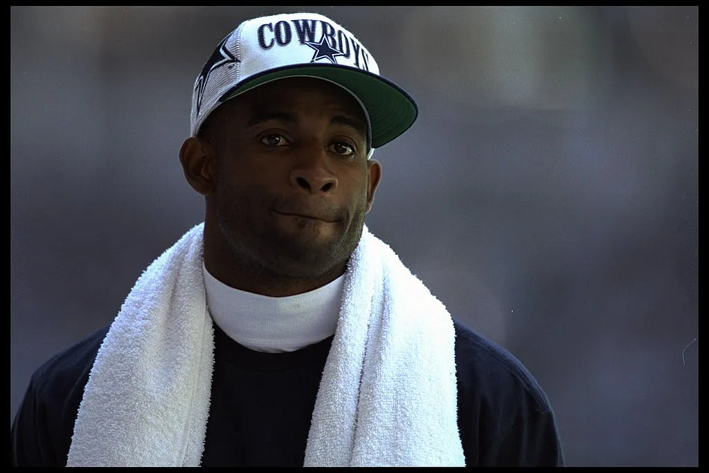 8 OCT 1995: DALLAS CORNERBACK DEION SANDERS ON THE SIDELINE DURING THE COWBOYS 34-24 VICTORY OVER THE GREEN BAY PACKERS AT TEXAS STADIUM IN IRVING, TEXAS. 
