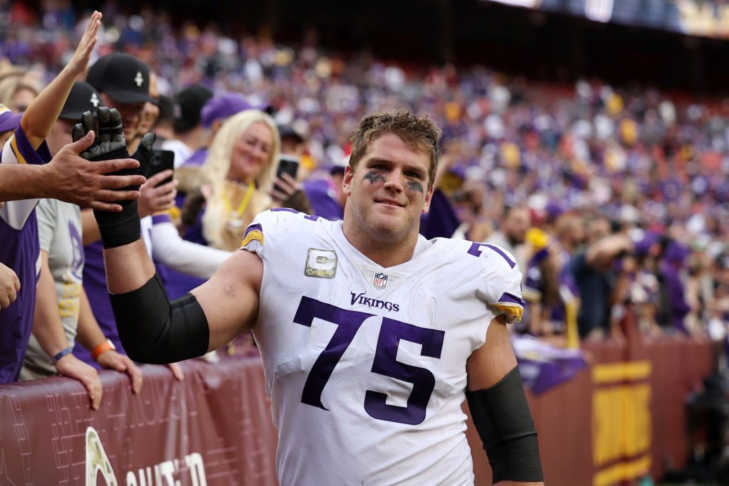 LANDOVER, MARYLAND - NOVEMBER 06: Brian O'Neill #75 of the Minnesota Vikings celebrates after the game against the against the Washington Commanders at FedExField on November 06, 2022 in Landover, Maryland.