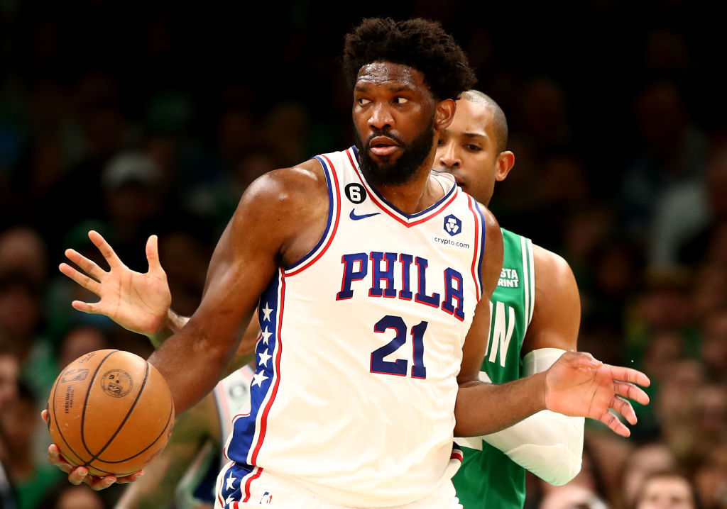 BOSTON, MASSACHUSETTS - MAY 14: Joel Embiid #21 of the Philadelphia 76ers controls the ball against Al Horford #42 of the Boston Celtics during the first quarter in game seven of the 2023 NBA Playoffs Eastern Conference Semifinals at TD Garden on May 14, 2023 in Boston, Massachusetts.