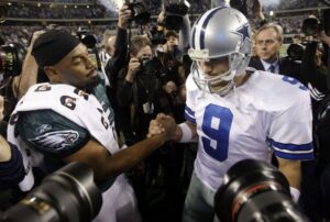 Donovan McNabb of the Philadelphia Eagles and Tony Romo of the Dallas Cowboys after "The Air Guitar Game"