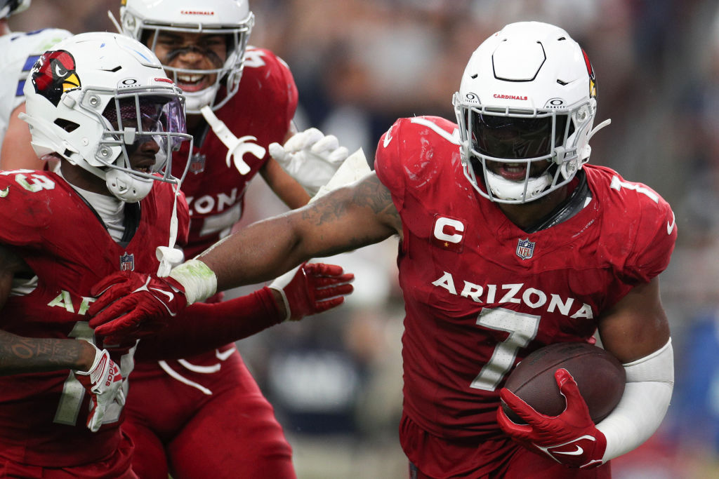 GLENDALE, ARIZONA - SEPTEMBER 24: Kyzir White #7 of the Arizona Cardinals celebrates an interception with teammates during the fourth quarter of a game against the Dallas Cowboys  at State Farm Stadium on September 24, 2023 in Glendale, Arizona.