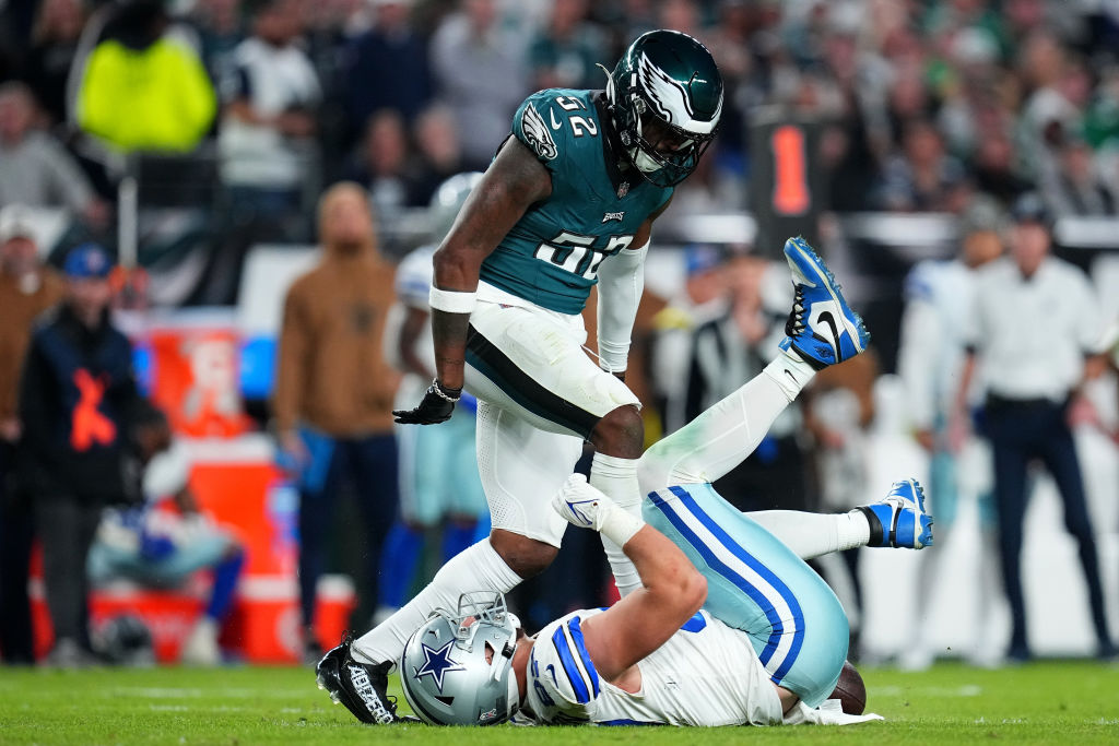 PHILADELPHIA, PENNSYLVANIA - NOVEMBER 05: Zach Cunningham #52 of the Philadelphia Eagles reacts over Jake Ferguson #87 of the Dallas Cowboys during the third quarter at Lincoln Financial Field on November 05, 2023 in Philadelphia, Pennsylvania.