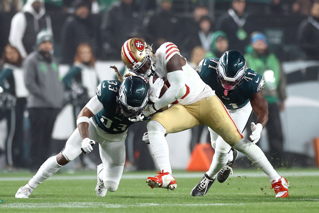 PHILADELPHIA, PENNSYLVANIA - DECEMBER 03: Deebo Samuel #19 of the San Francisco 49ers makes a reception between Bradley Roby #33 and Nicholas Morrow #41 of the Philadelphia Eagles at Lincoln Financial Field on December 03, 2023 in Philadelphia, Pennsylvania. 