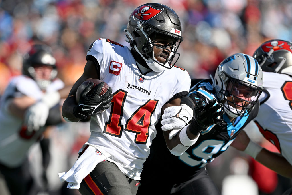 CHARLOTTE, NORTH CAROLINA - JANUARY 07: Chris Godwin #14 of the Tampa Bay Buccaneers runs with the ball during the first quarter against the Carolina Panthers at Bank of America Stadium on January 07, 2024 in Charlotte, North Carolina. 