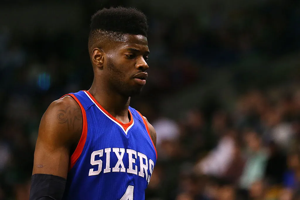 BOSTON, MA - FEBRUARY 06:  Nerlens Noel #4 of the Philadelphia 76ers enters the huddle during a timeout during the second quarter against the Boston Celtics at TD Garden on February 6, 2015 in Boston, Massachusetts.  