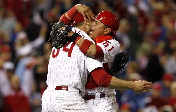 PHILADELPHIA - OCTOBER 06: Roy Halladay #34 and Carlos Ruiz #51 of the Philadelphia Phillies celebrate Halladay's no-hitter and the win in Game 1 of the NLDS against the Cincinnati Reds at Citizens Bank Park on October 6, 2010 in Philadelphia, Pennsylvania. 