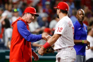 Rob Thomson and Kyle Schwarber of the Philadelphia Phillies