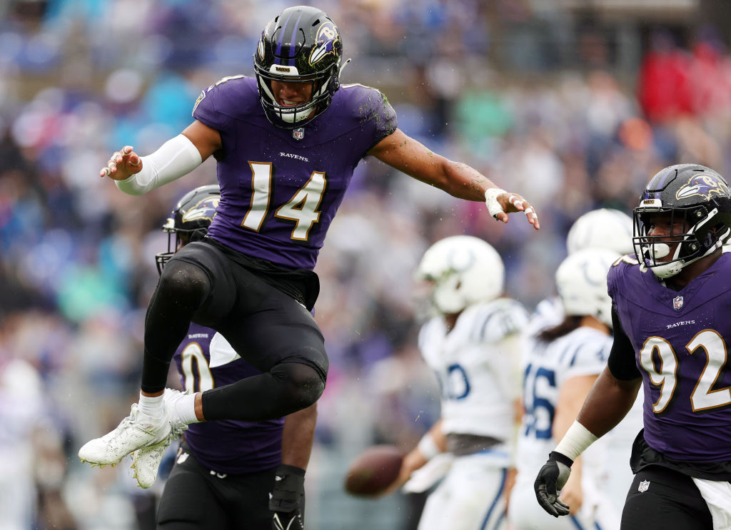 BALTIMORE, MARYLAND - SEPTEMBER 24: Kyle Hamilton #14 of the Baltimore Ravens celebrates after sacking Gardner Minshew #10 of the Indianapolis Colts in the first quarter at M&T Bank Stadium on September 24, 2023 in Baltimore, Maryland.
