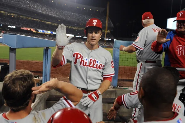 LOS ANGELES, CA - JUNE 27: Chase Utley #26 of the Philadelphia Phillies returns to the dugout after hitting a homerun in the seventh inning against the Los Angeles Dodgers at Dodger Stadium on June 27, 2013 in Los Angeles, California. 