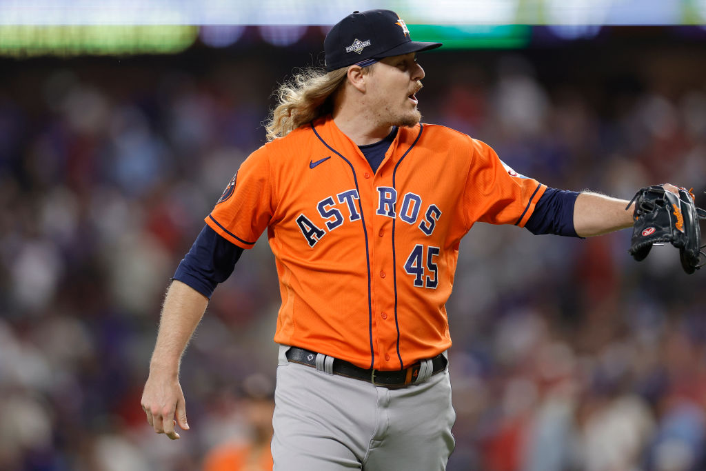 Ryne Stanek #45 of the Houston Astros celebrates after getting the third out in the third inning against the Texas Rangers during Game Four of the Championship Series at Globe Life Field