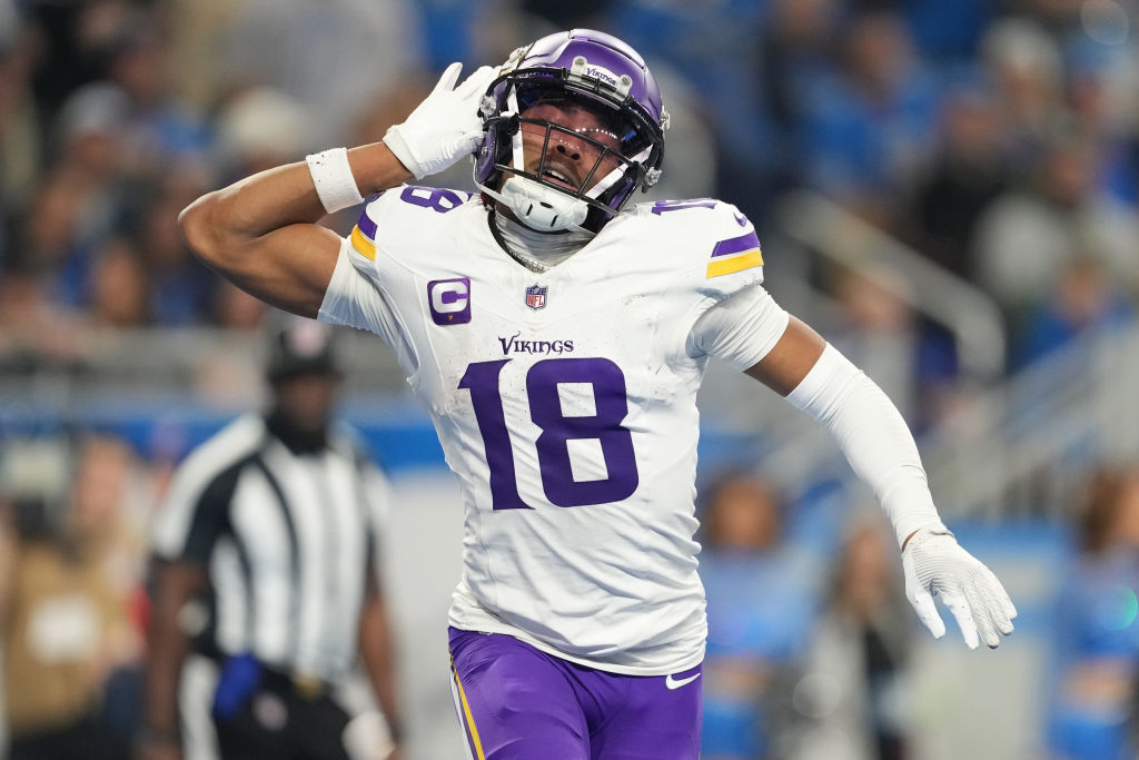 DETROIT, MICHIGAN - JANUARY 07: Justin Jefferson #18 of the Minnesota Vikings celebrates after a touchdown during the third quarter in the game against the Detroit Lions at Ford Field on January 07, 2024 in Detroit, Michigan.