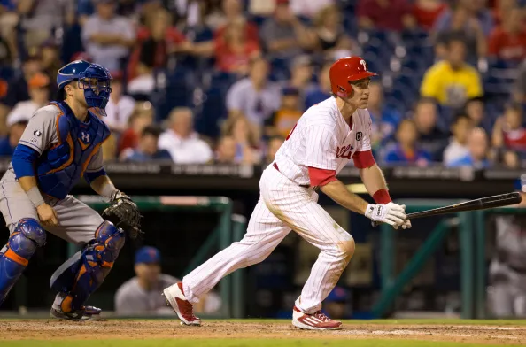 PHILADELPHIA, PA - AUGUST 8: Second baseman Chase Utley #26 of the Philadelphia Phillies hits a double in the bottom of the ninth inning against the New York Mets on August 8, 2014 at Citizens Bank Park in Philadelphia, Pennsylvania.