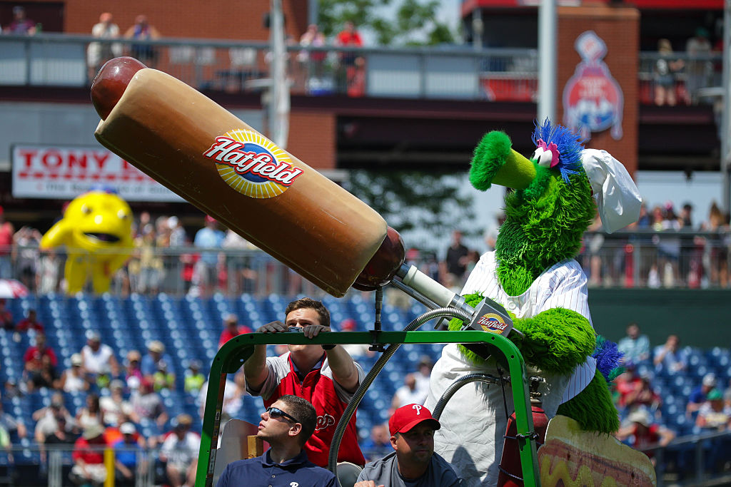 PHILADELPHIA, PA - JUNE 20: The Phillie Phanatic launches Hatfield hotdogs into the stands between innings during a game between the Philadelphia Phillies and the Arizona Diamondbacks on Dollar Dog Night