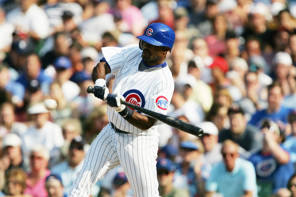 CHICAGO - JUNE 17:  Tony Womack #1 of the Chicago Cubs bats against the Detroit Tigers on June 17, 2006 at Wrigley Field in Chicago, Illinois. The Tigers defeated the Cubs 9-3. 