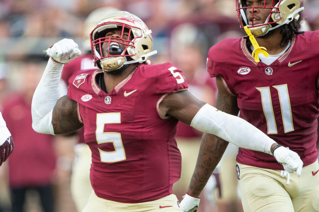 Defensive lineman Jared Verse #5 of the Florida State Seminoles celebrates after a big play during the second half of their game against the Virginia Tech Hokies at Doak Campbell Stadium 