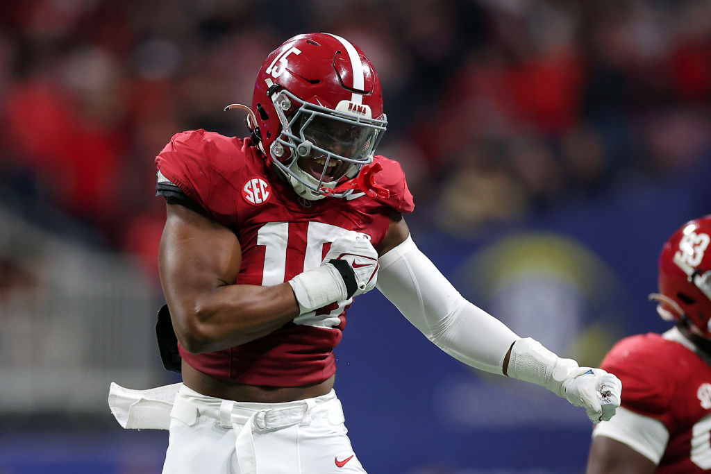  Dallas Turner #15 of the Alabama Crimson Tide reacts after a sack during the second quarter against the Georgia Bulldogs in the SEC Championship at Mercedes-Benz Stadium 