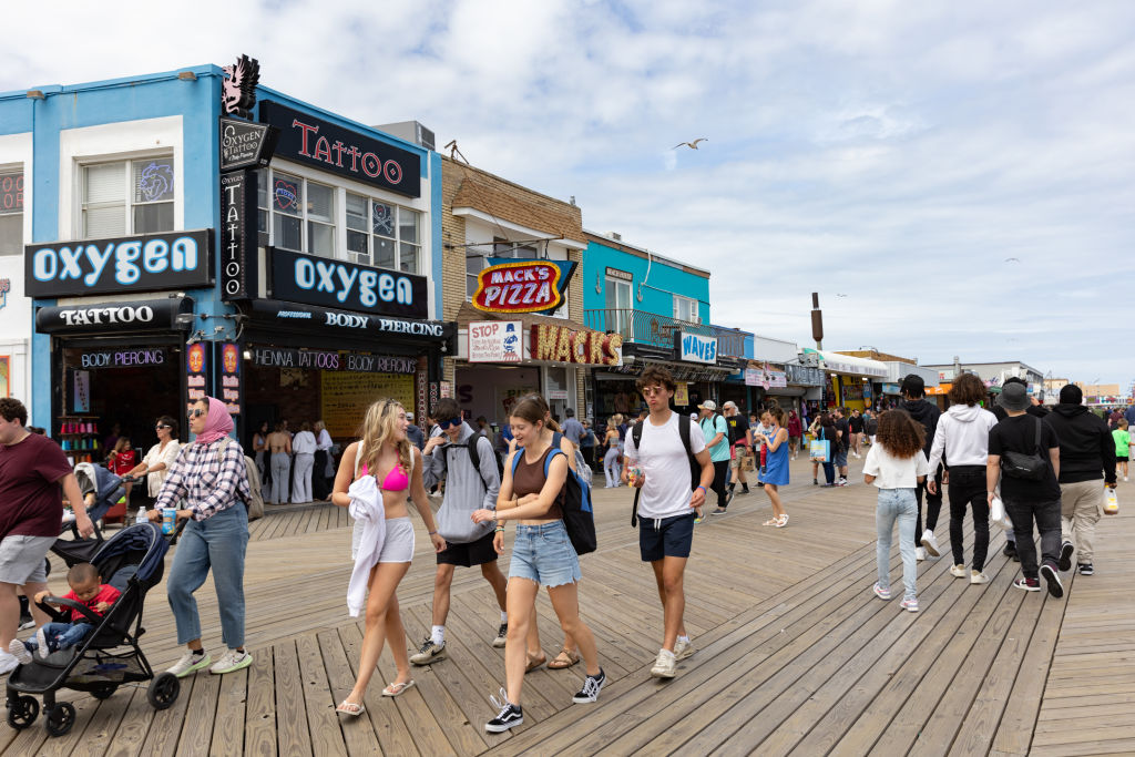 WILDWOOD, NEW JERSEY - MAY 27: People spend time on the boardwalk during the Memorial Day weekend on May 28, 2023 in Wildwood, New Jersey. Memorial Day weekend kicks off the start of the beach season on the East Coast. 