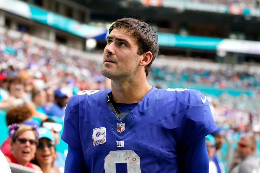 MIAMI GARDENS, FLORIDA - OCTOBER 08: Daniel Jones #8 of the New York Giants leaves the field after an injury against the Miami Dolphins during the fourth quarter at Hard Rock Stadium on October 08, 2023 in Miami Gardens, Florida.