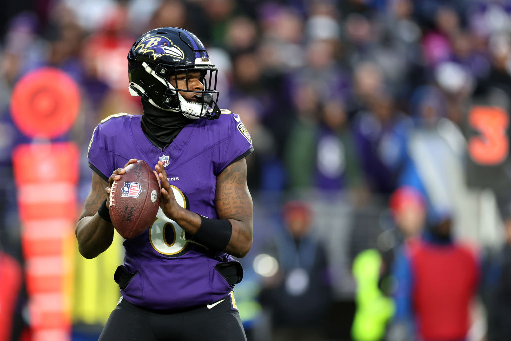 BALTIMORE, MARYLAND - JANUARY 28: Quarterback Lamar Jackson #8 of the Baltimore Ravens drops back to pass against the Kansas City Chiefs in the AFC Championship Game at M&T Bank Stadium on January 28, 2024 in Baltimore, Maryland.