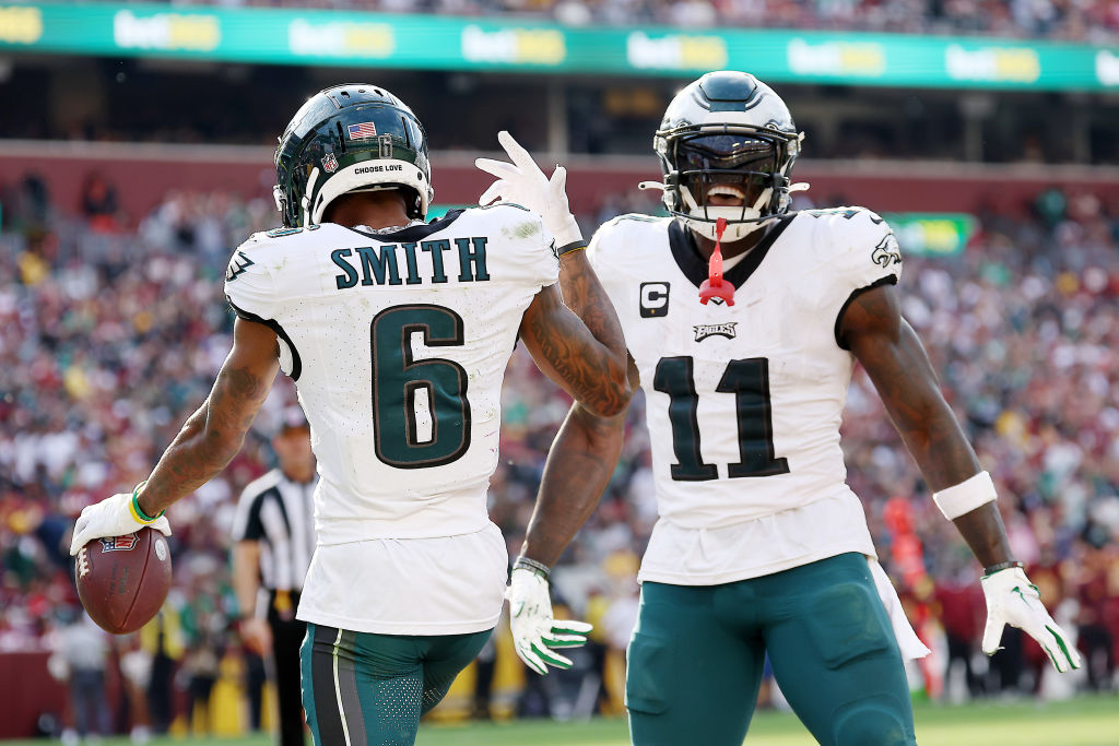 LANDOVER, MARYLAND - OCTOBER 29: DeVonta Smith #6 of the Philadelphia Eagles celebrates a touchdown with AJ Brown #11 during the fourth quarter against the Washington Commanders at FedExField on October 29, 2023 in Landover, Maryland.