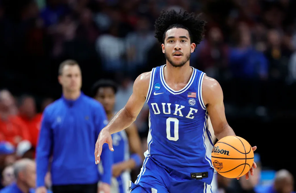 DALLAS, TEXAS - MARCH 29: Jared McCain #0 of the Duke Blue Devils controls the ball during the 1st half of the Sweet 16 round of the NCAA Men's Basketball Tournament game against the Houston Cougars at American Airlines Center on March 29, 2024 in Dallas, Texas.