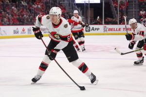 Jakob Chychrun #6 of the Ottawa Senators takes a first period shot while playing the Detroit Red Wings at Little Caesars Arena on January 31, 2024 in Detroit, Michigan.