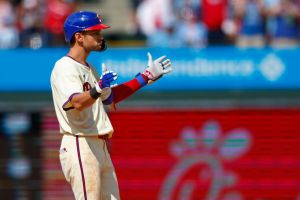 Trea Turner #7 of the Philadelphia Phillies gestures after hitting a two-run single and advancing to second on an error against the Miami Marlins during the seventh inning of a game at Citizens Bank Park on June 30, 2024 in Philadelphia, Pennsylvania.