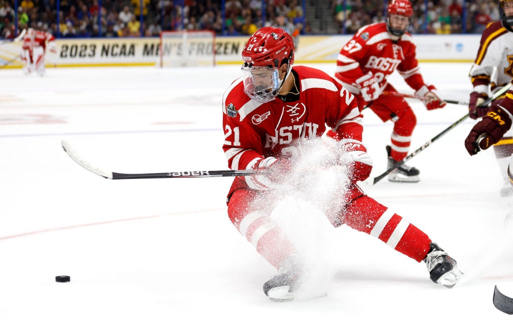 Devin Kaplan #21 of the Boston UniversityTerriers looks to pass in the third period during a semifinal of the 2023 Frozen Four against the Minnesota Golden Gophers at Amalie Arena on April 06, 2023 in Tampa, Florida.